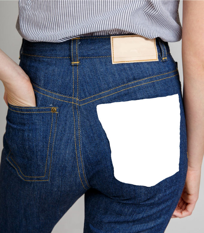 A girl's behind. Unceremoniously, it's her ass. Thankfully, it's covered by some jeans