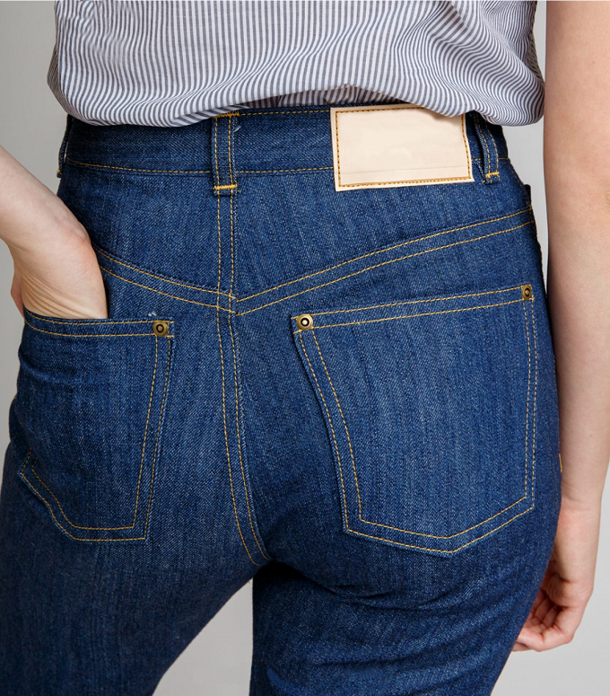 A girl's behind. Unceremoniously, it's her ass. Thankfully, it's covered by some jeans